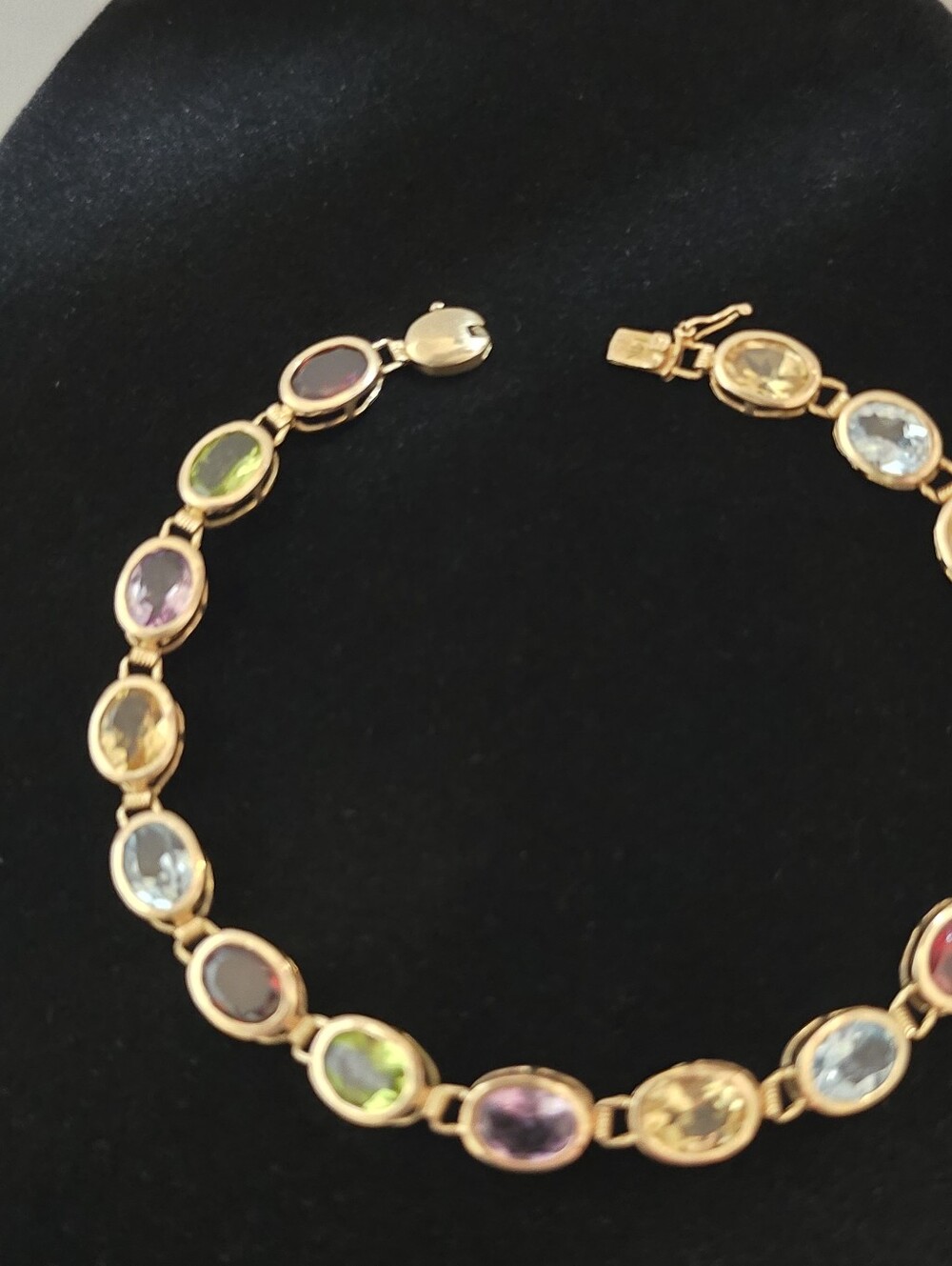 14 Karat Amethyst, Peridot, Garnet, Blue and Yellow Topaz Ladies Bracelet 7.25"